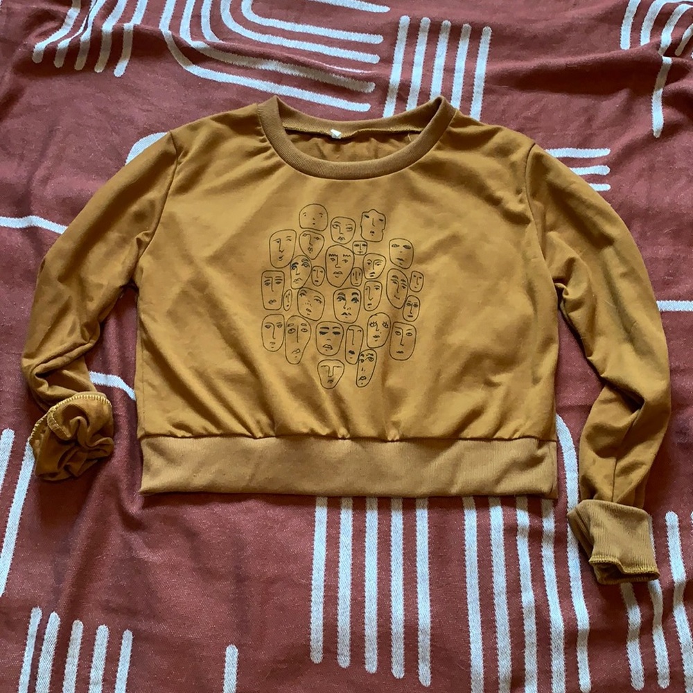 Abstract Faces Camel Brown Cropped Sweater